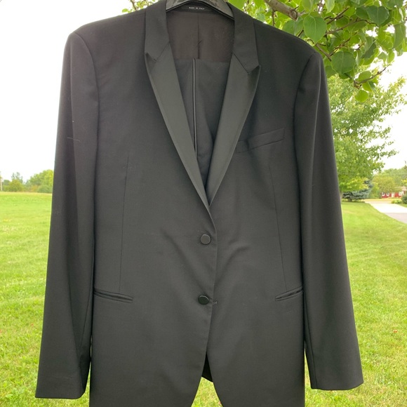 Male Armani Tuxedo black jacket and pants.